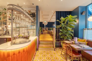 a restaurant with a bar and table