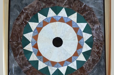 Acrylic painting including details of marble floor mosaic in shape of mandela 