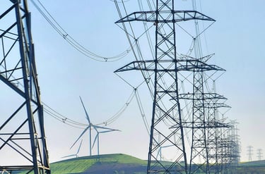 Power lines running through a field