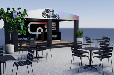 Vue du stand, des tables et des chaises se trouvant autour