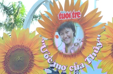 a sign with a picture of a young girl in a sunflower