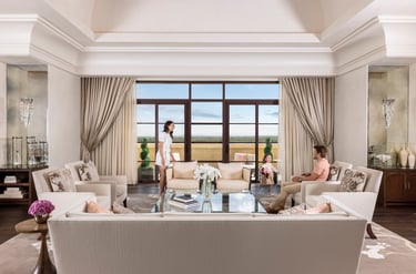 Expansive living room interior of the luxury Grand Suite at Four Seasons Resort Orlando near Disney World.
