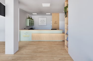 Heller, moderner Empfangsbereich einer Frauenarztpraxis (GYNPLUS) im 21. Bezirk mit Holz- und Pastel