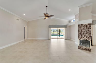 Spacious empty living room without virtual home staging. 