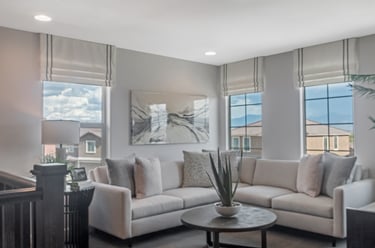 a living room with a couch and a coffee table