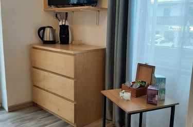 a small table with a small table and a television