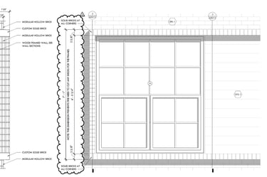 A construction detail drawing of a brick framed window