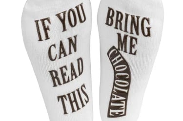 a pair of socks with the words, if you can't read this,