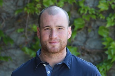 a man in a blue shirt and a blue shirt