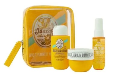 a yellow bag with a small bag of cream and a bottle of cream