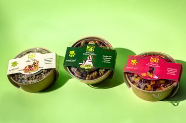 three small containers of pet food that include nuts and nuts