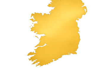 A golden metallic silhouette of the map of Ireland isolated on a solid black background.