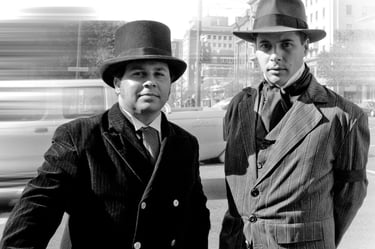 Two men in period costume, corner North terrace and King William Street, Adelaide.