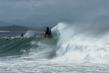 A surfer at Byron Bay