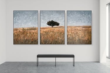 Large triptych painting by Martin Osner showing a single tree in a field of warm brown grasses under a soft grey sky
