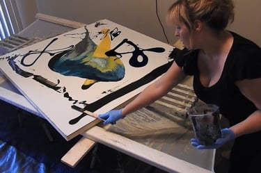 I am in gloves and painting an abstract painting