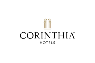 Elegant gold minimalist Greek pillar logo of Corinthia Hotels centered on a solid black background.