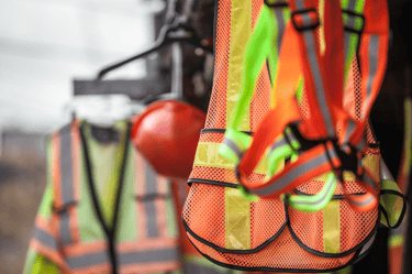 a group of safety vests with safety vests