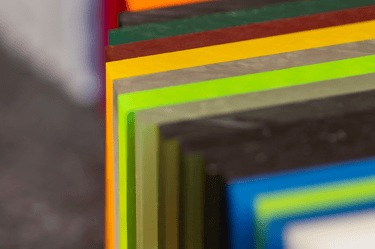 a stack of colorful colored acrylic