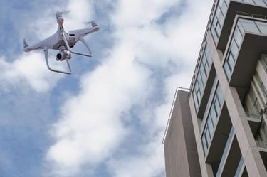 Drone Inspecting Mid Rise Building