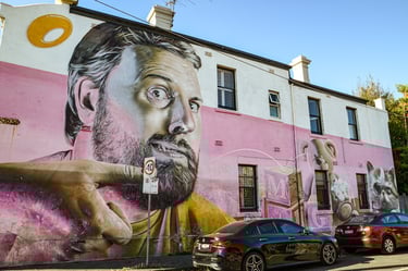 Mural by Smug in Fitzroy, Melbourne