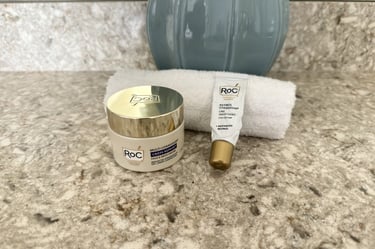 RoC Eye Cream and RoC Crepe Repair with white washcloth on counter, nightly firming skincare routine