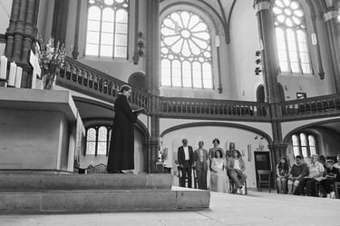 Pastor preaching in a church during a wedding ceremony.