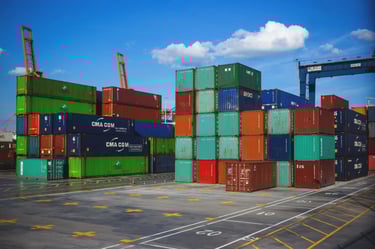 a large amount of containers stacked on top of each other