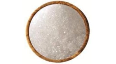 Decorative pink salt block on wrought iron stand for kitchen or wellness room display