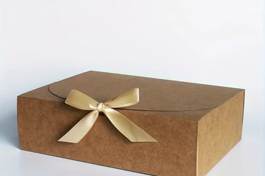 gift box with beige, brown and gold cardboard bow