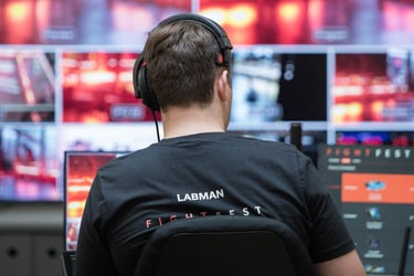 Ben, one of the organisers of FightFest, running the livestream for the 2022 event.