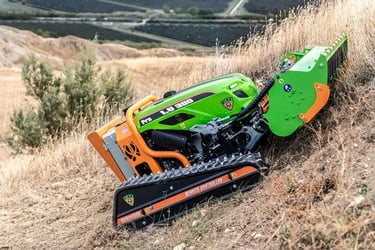 Green Climber LV 300 Pro Model mowing vegetation up a hillside