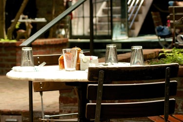 a table with a table with dishes petit dejeuner repas de midis lyon