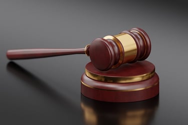 A gavel on a grey background representing legal translations