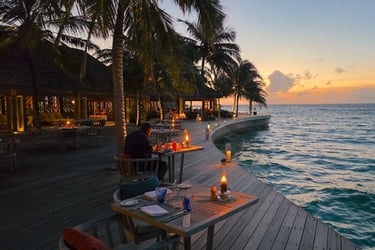 Hurawalhi Maldives canneli restaurant sunset