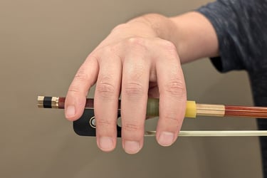 hand dropped on bow stick