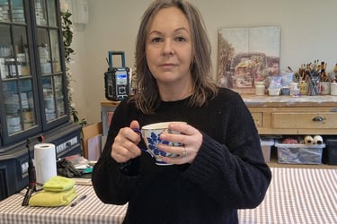 Julia Wheatley owner of Absolutely Mintage in her studio