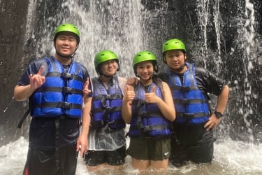 Scenic waterfall along the Ayung River during white water rafting in Ubud, Bali