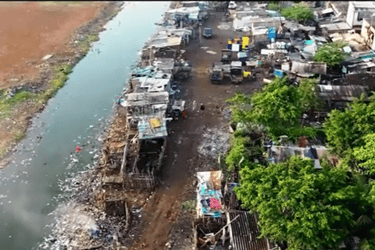a river with a lot of garbage and a lot of trash