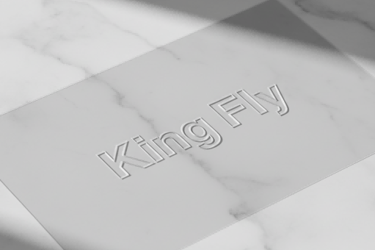 A clear PVC heat-pressed pouch with a perfect embossed King Fly LOGO, showing no stitching lines.