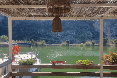 a boat ona Dalyan River, one of the best places to visit in Dalyan