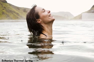 a woman bathing in Sultaniye Thermal Springs, one of the best places to visit in Dalyan