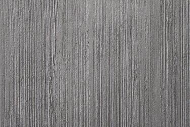 Microcemento metallic plateado, con textura aplicación  sobre muro