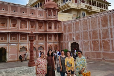 a group of people standing in front of a building