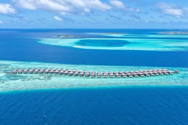 Hurawalhi Maldives overwater villas arial view