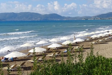 Crystal Beach, Kalamaki, ideal for swimming for its shallow waters and sand, part of Marine park, closest to Villa Olga