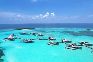 soneva-jani-drone-overwater-villas
