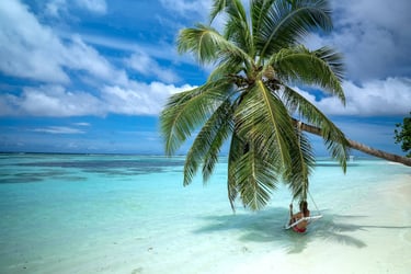 LUX South Ari Atoll Maldives beach swing