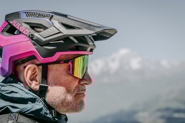 a man wearing a helmet and a helmet with a helmet on
