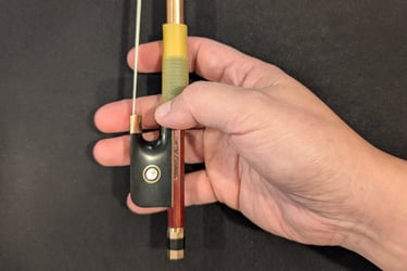 Curled thumb on the stick